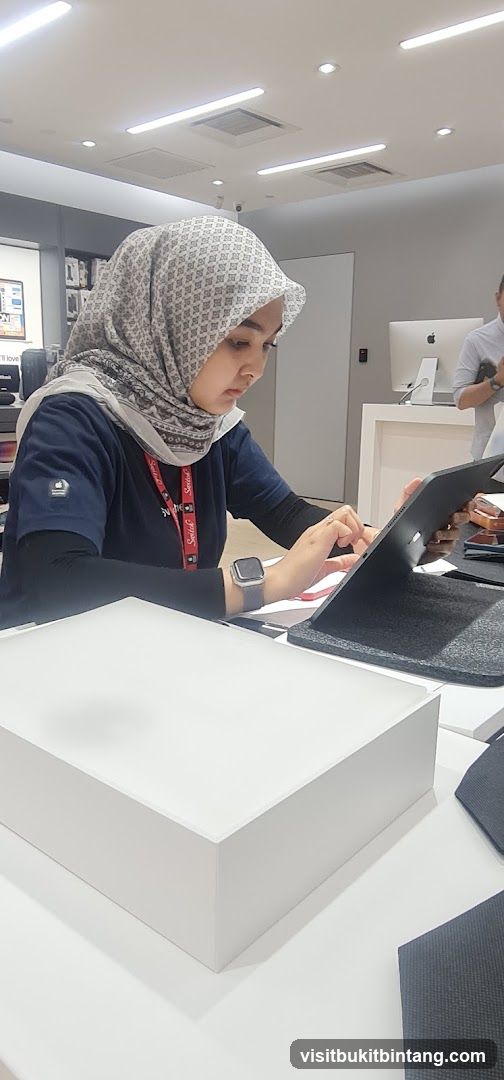 Employee using a tablet in a store