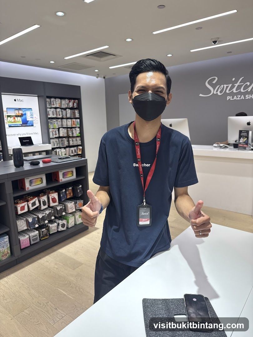Store employee giving thumbs up