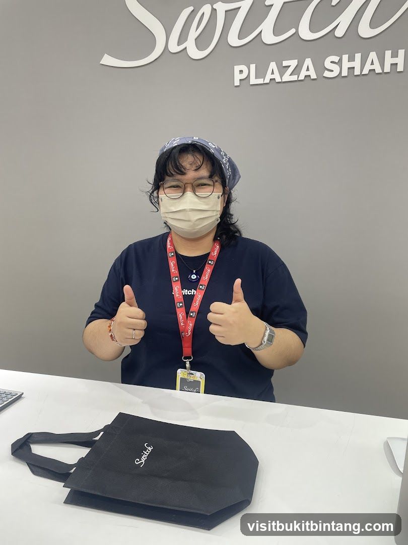 Employee giving thumbs up