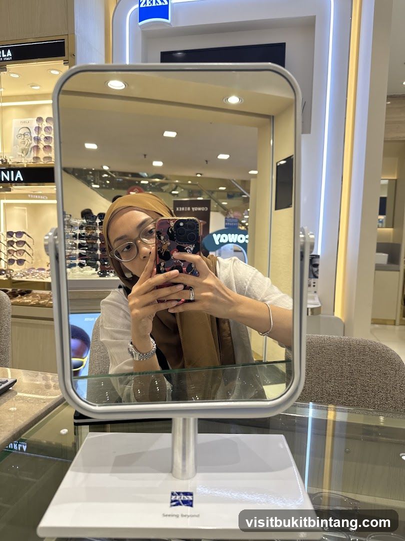 Woman taking a selfie in a mirror at an optical store