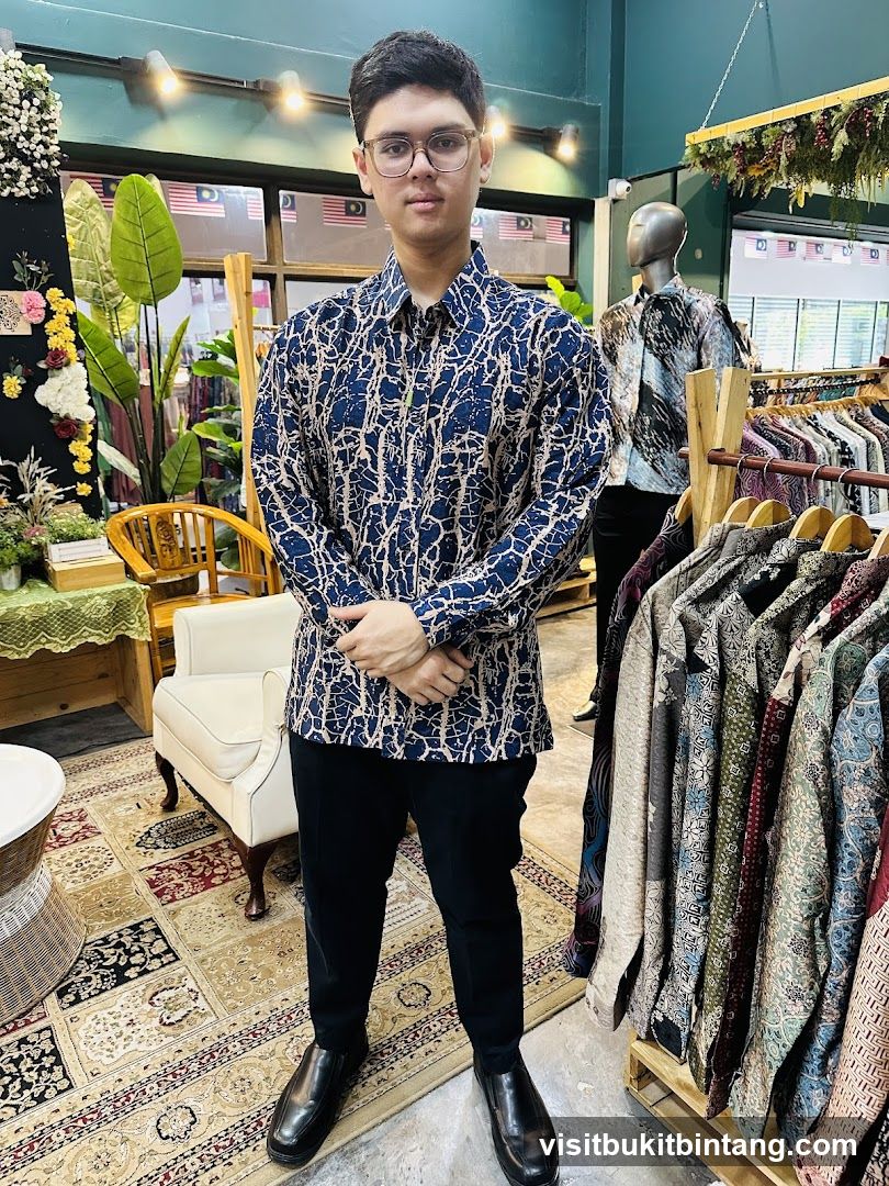 Man in Batik Shirt in Store