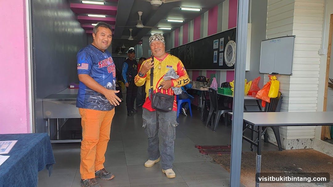 Two men standing in a shop