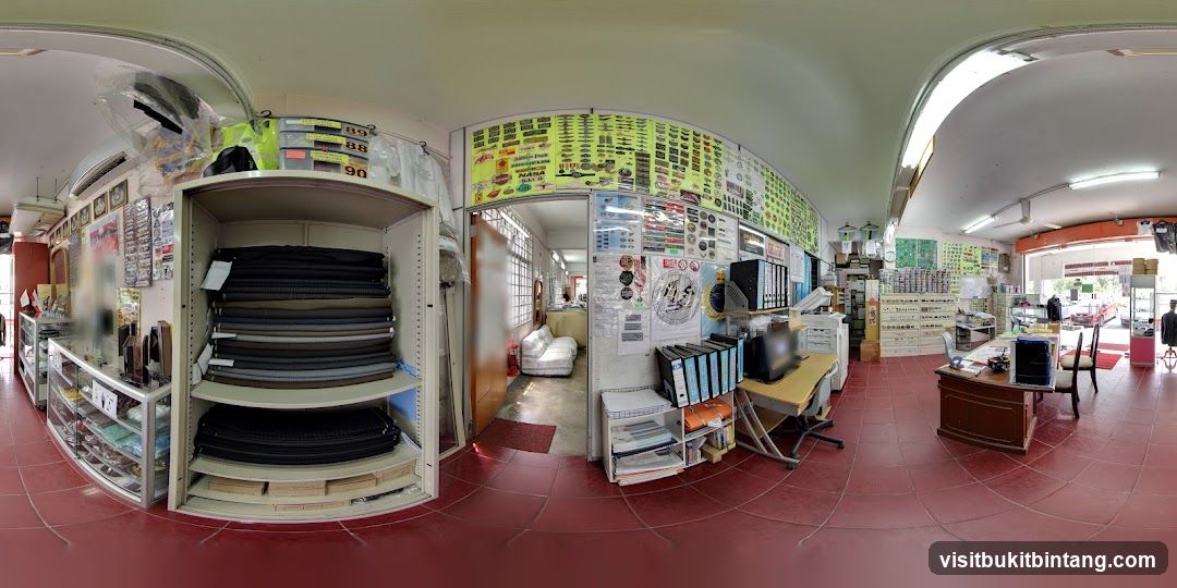 Interior of a shop with fabric rolls and display shelves