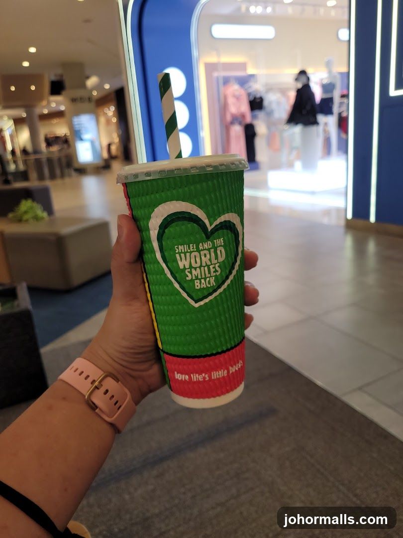 Green cup with straw