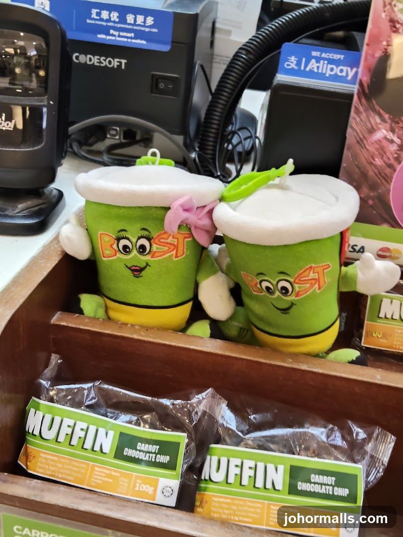 Plush toys and muffins at a counter