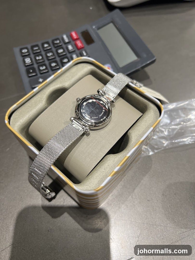 Watch in a box with a calculator