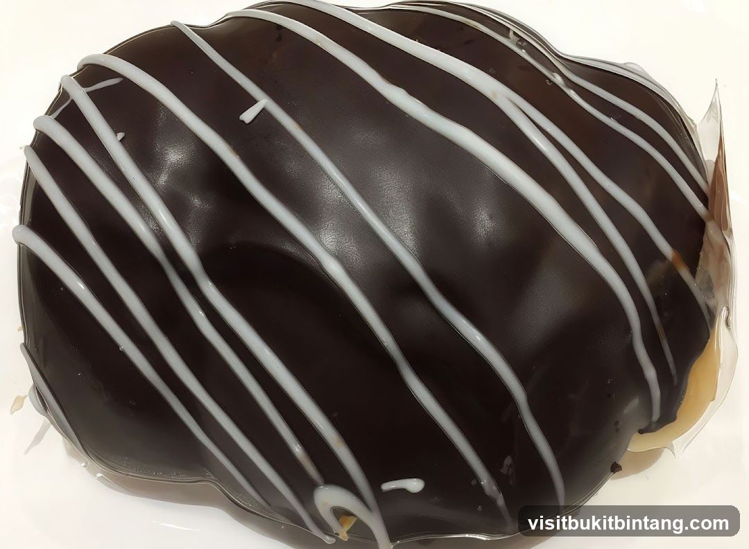 Chocolate Donut with White Drizzle
