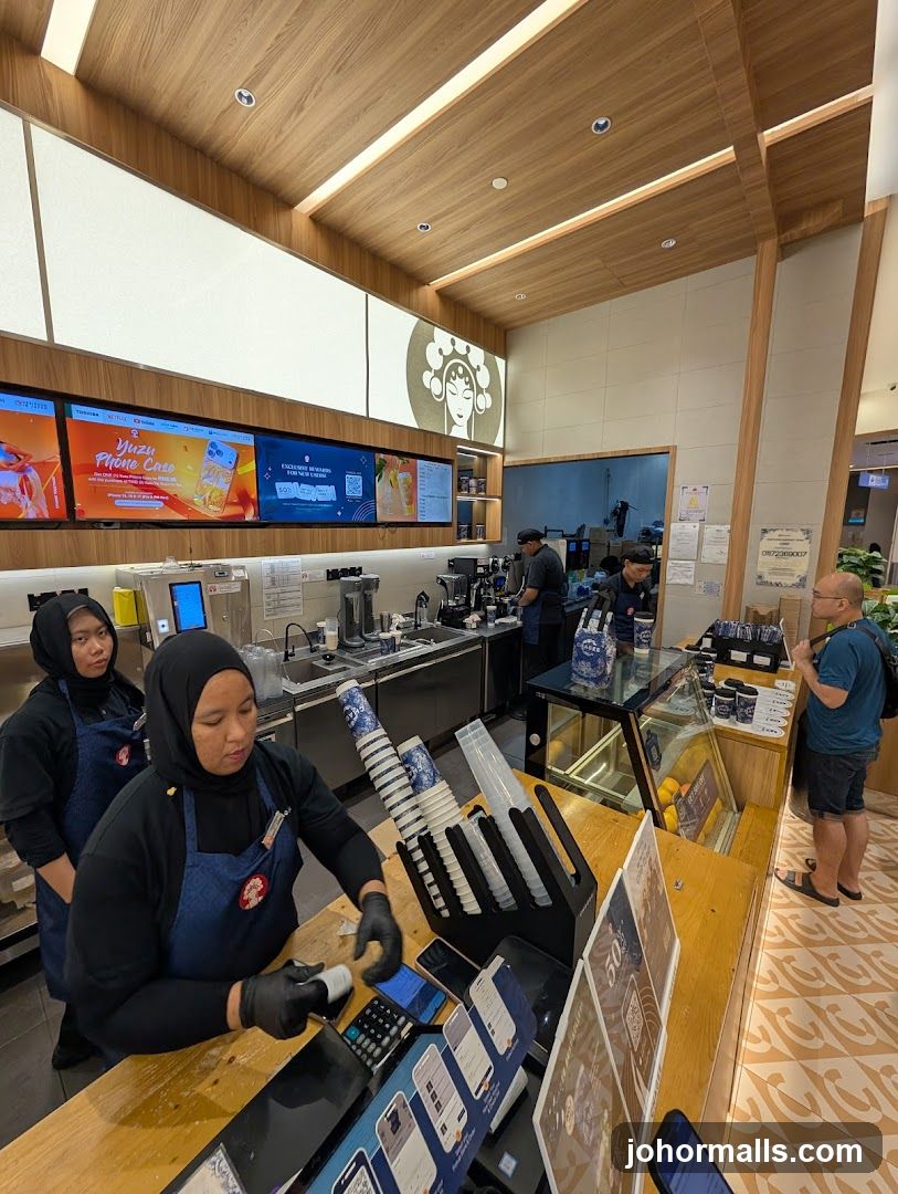 Baristas preparing drinks at a counter