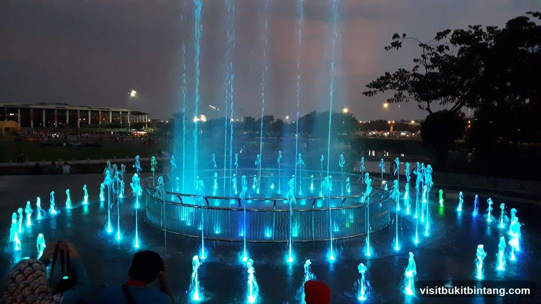 Illuminated Fountain Display at Dusk