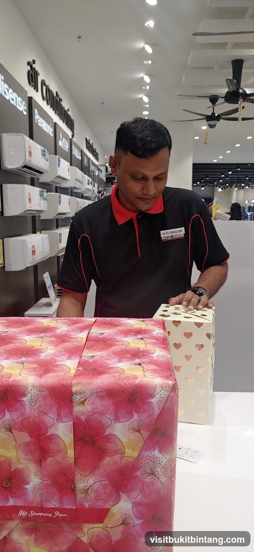 Sales Consultant with Gift-Wrapped Items