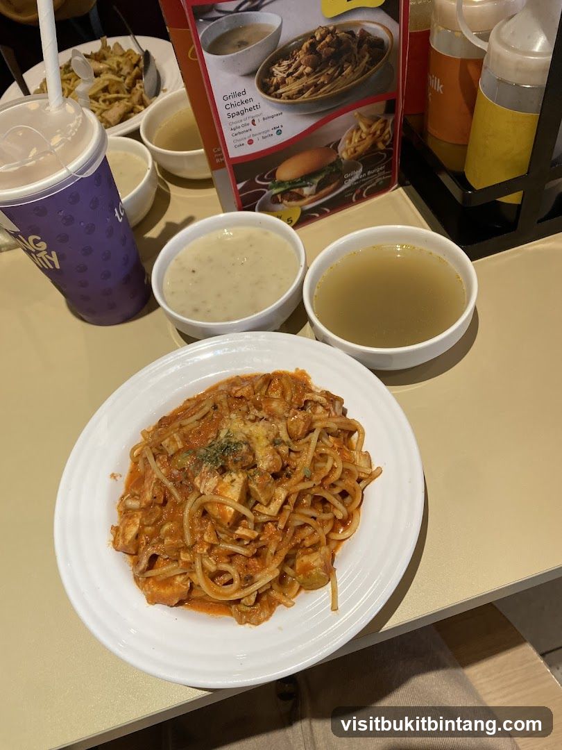 Spaghetti Meal with Soup and Drink