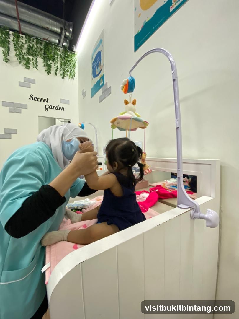 Childcare Provider Interacting with Baby