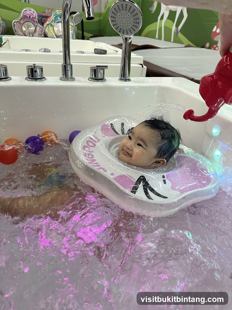 Baby enjoying a bath