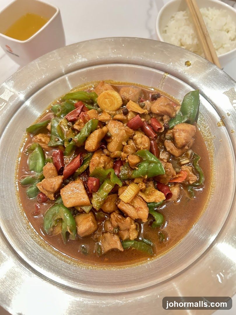 Spicy Chicken Stir-fry with Rice and Drink