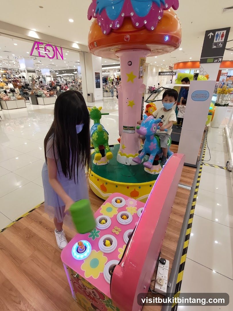 Children Playing at an Arcade Game