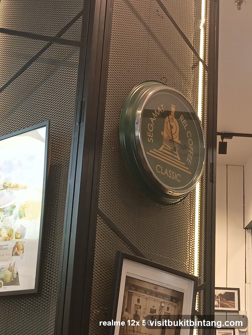 Coffee shop interior with clock and artwork