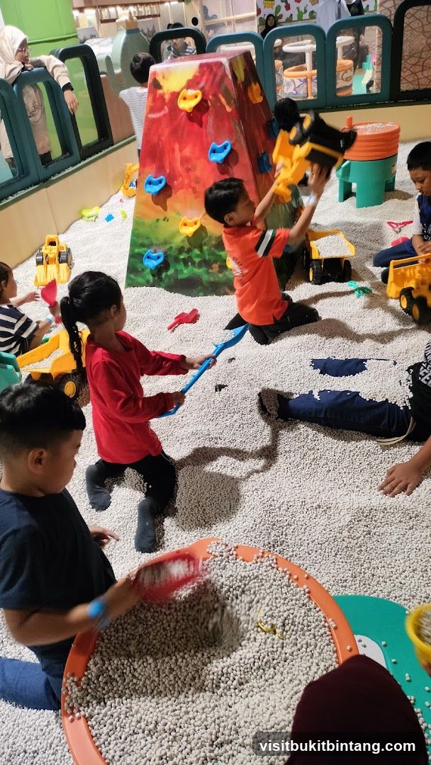 Children playing in a ball pit