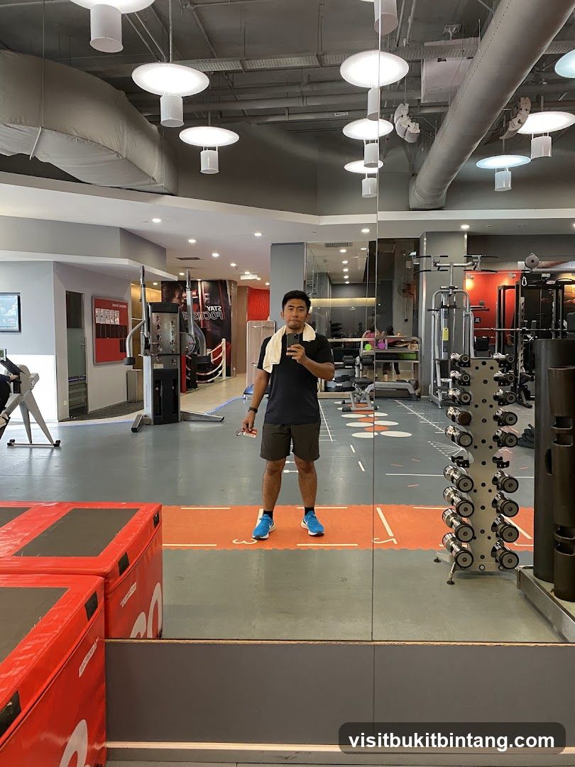 Gym Interior with Man Taking Selfie