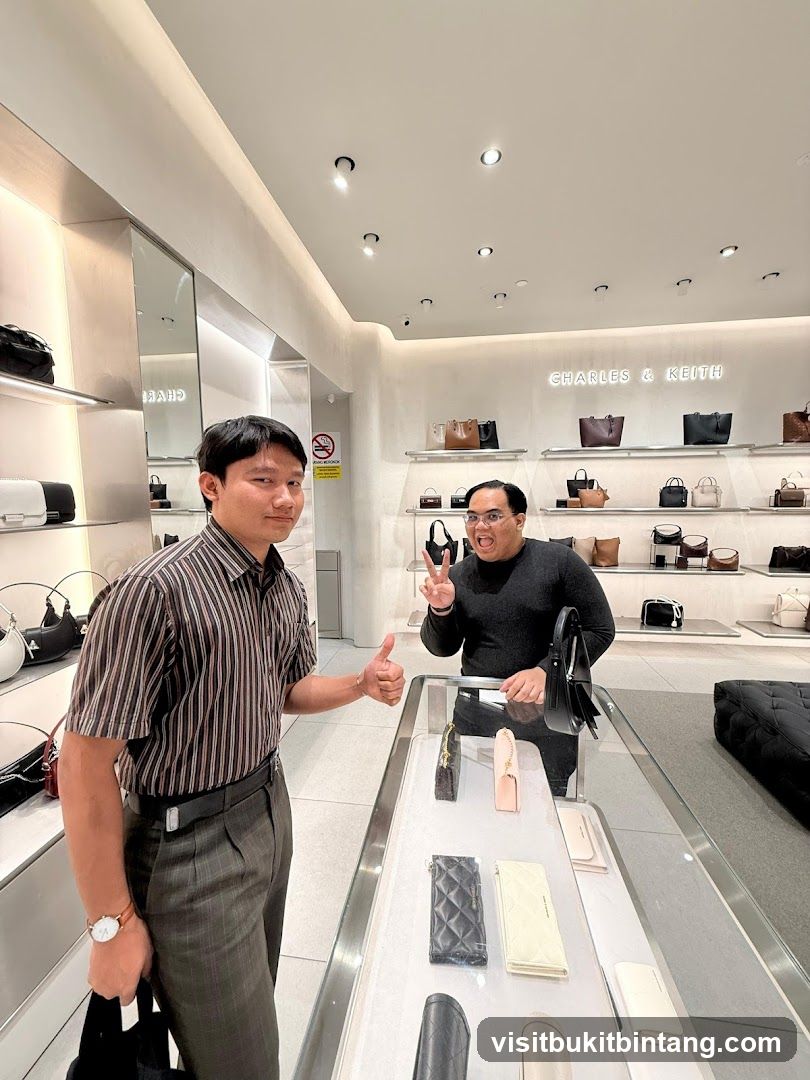 Two men in a handbag store