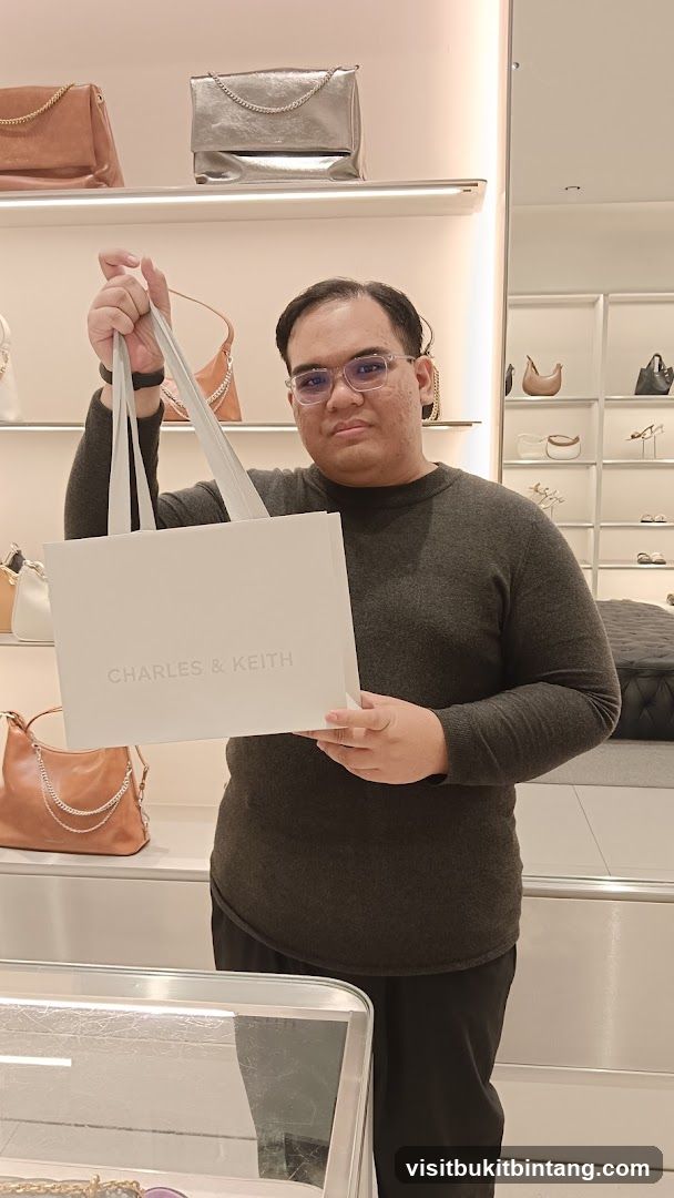 Man holding a shopping bag