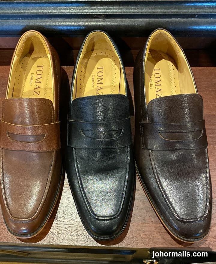 Three pairs of leather loafers
