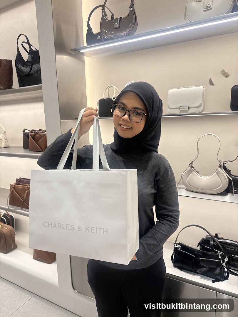 Woman Holding a Charles & Keith Shopping Bag