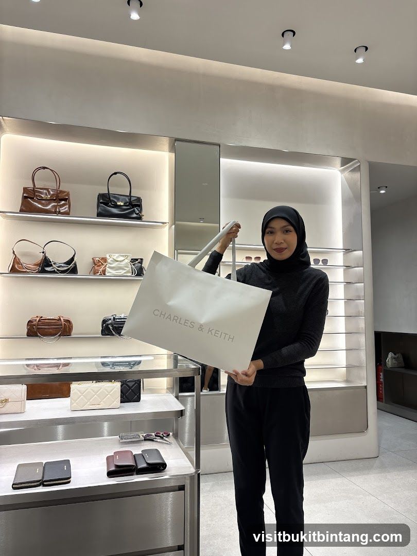 Woman Holding a Charles & Keith Shopping Bag