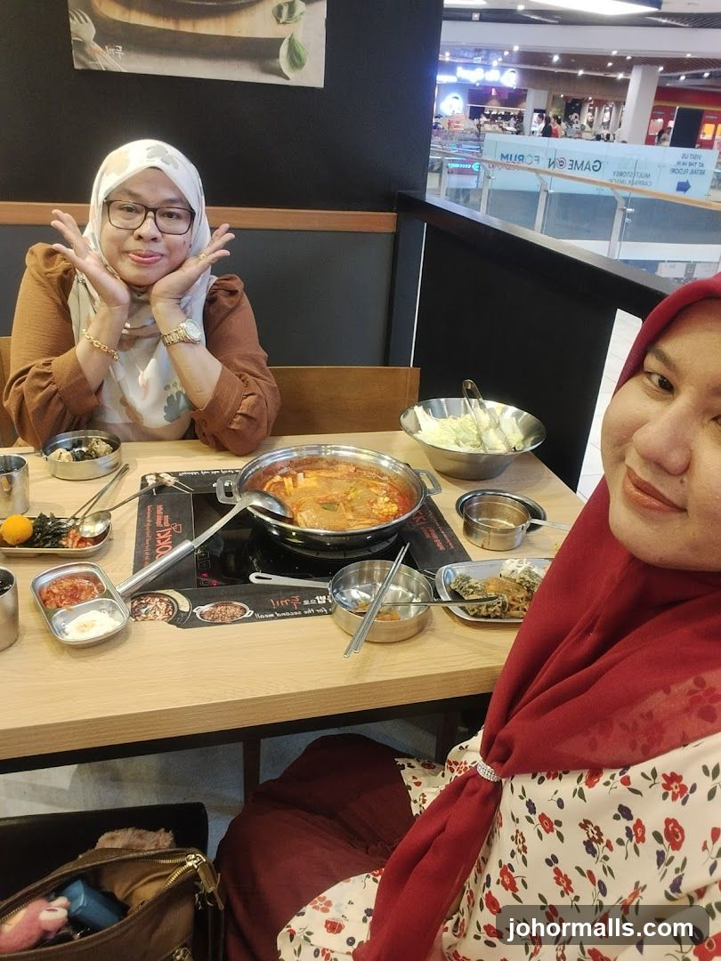 Two Women Enjoying a Korean Meal