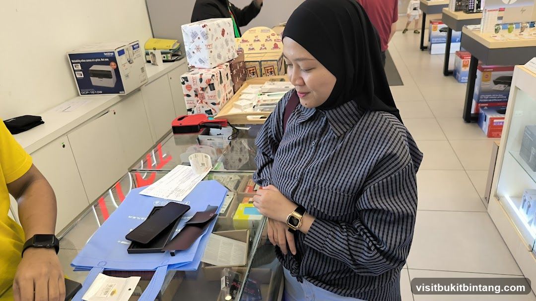 Customers browsing electronics store