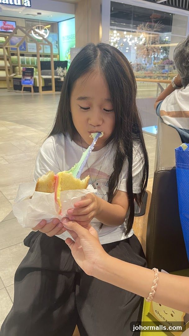 Girl Eating Rainbow Ice Cream Sandwich