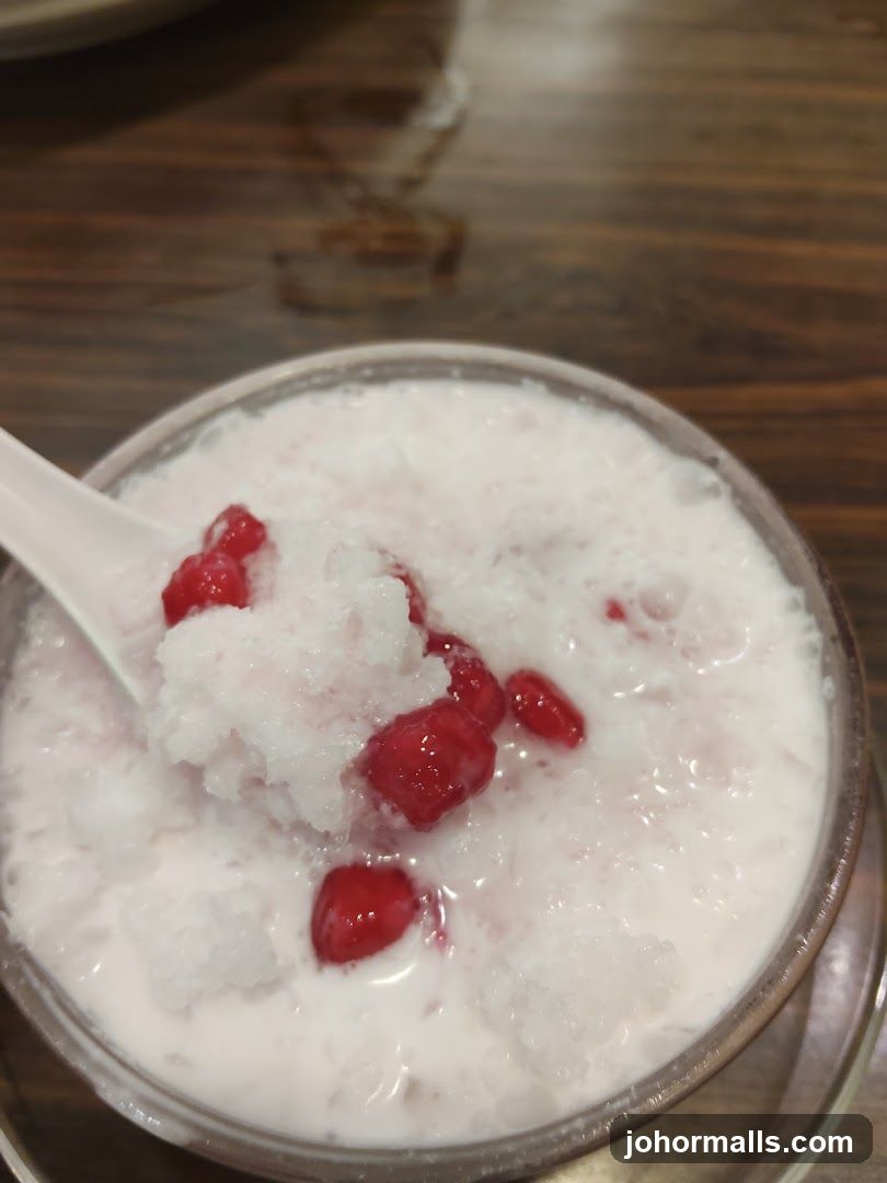 Dessert with shaved ice and red jelly