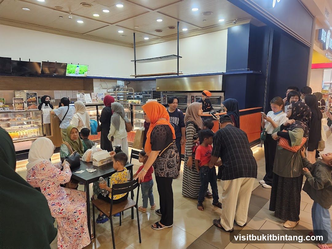 People queuing at a bakery