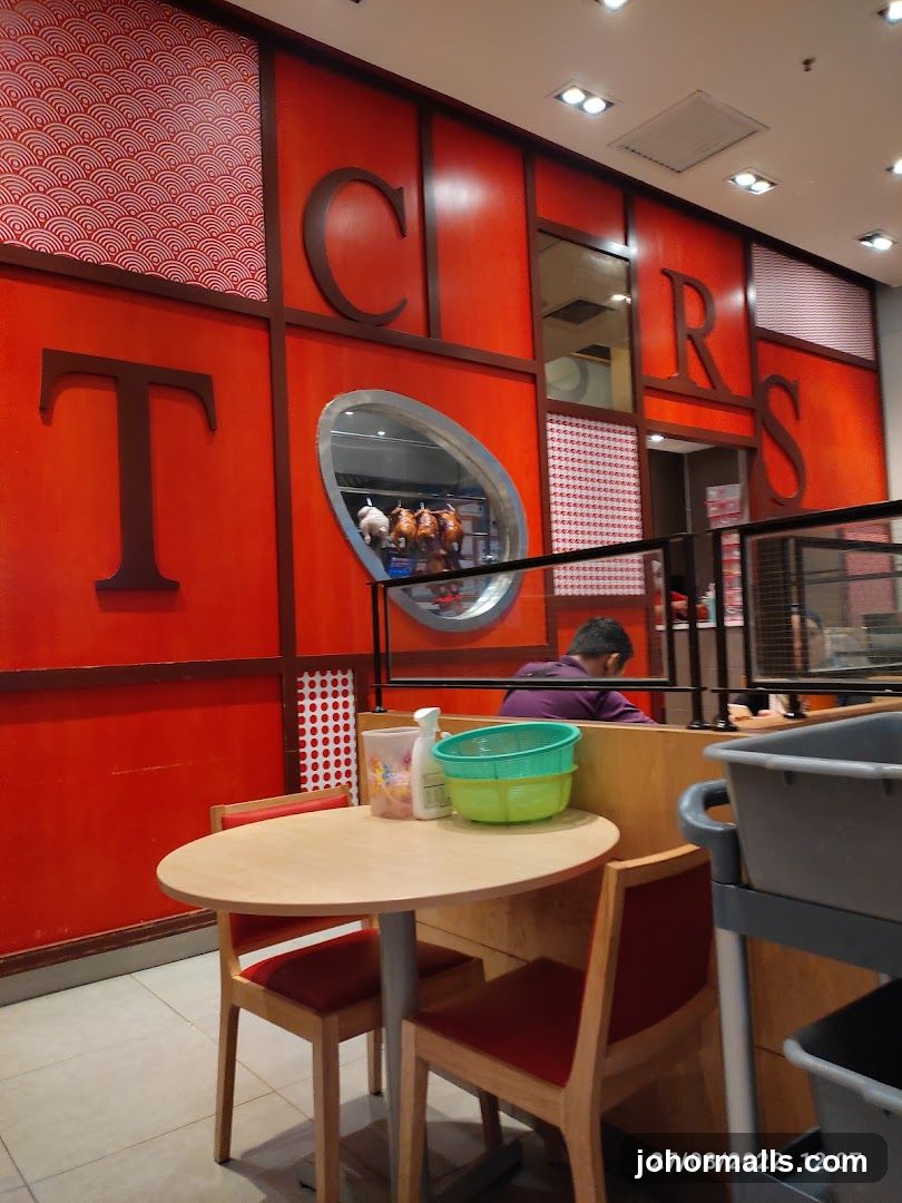Restaurant Interior with Roasted Chickens