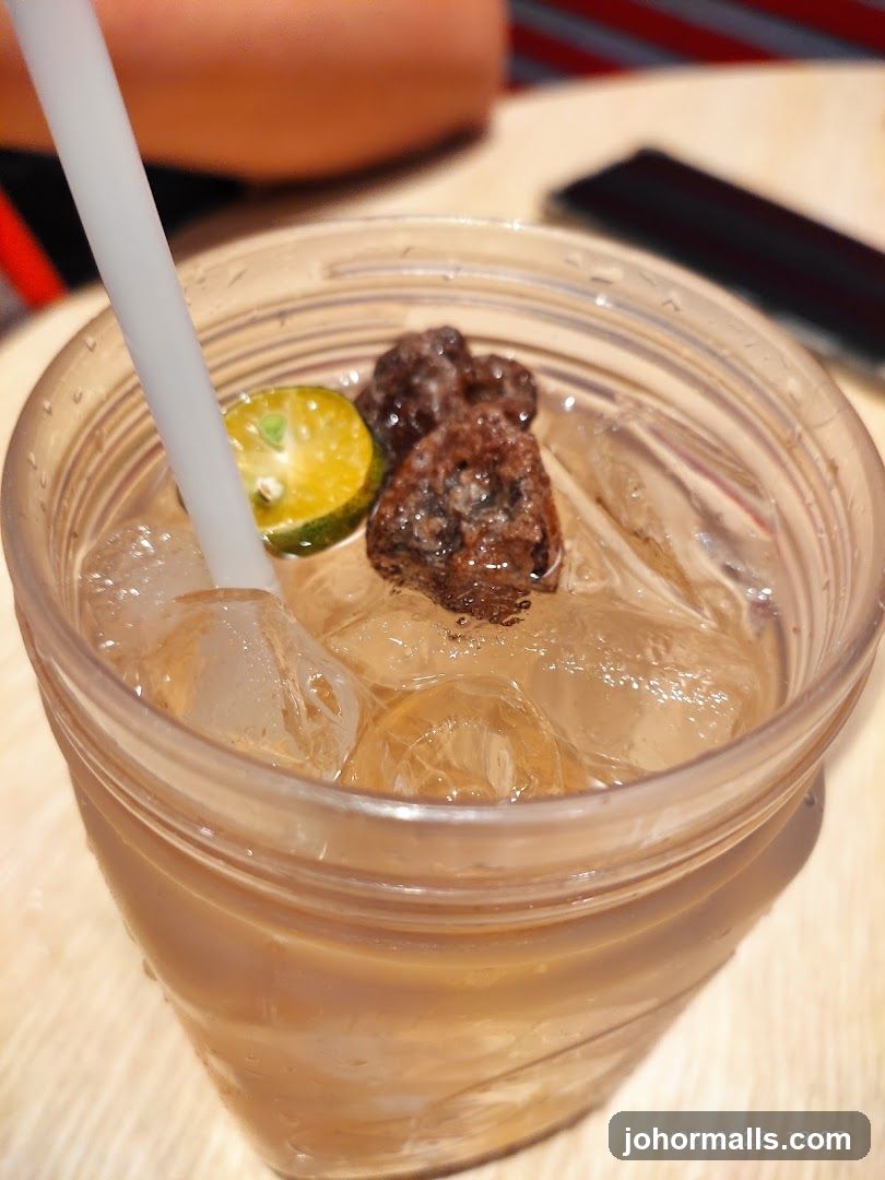Iced Drink with Lime and Preserved Fruit