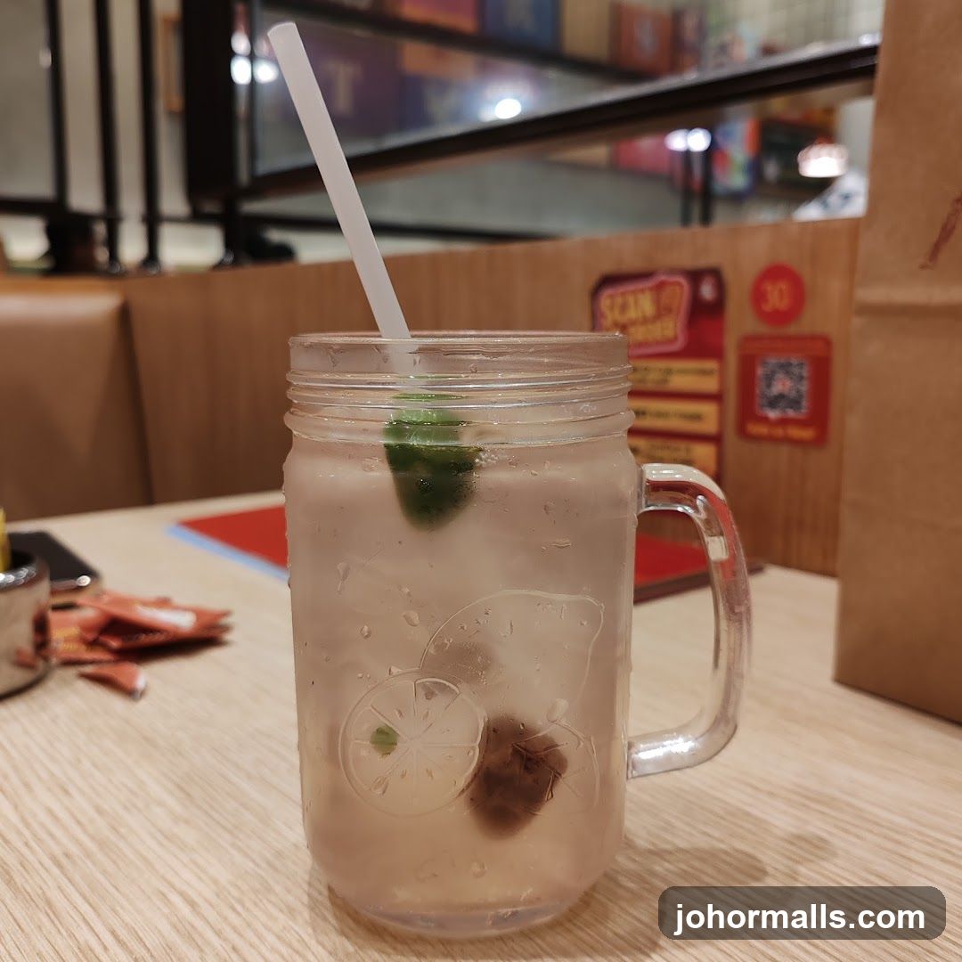 Drink with Lime and Plum
