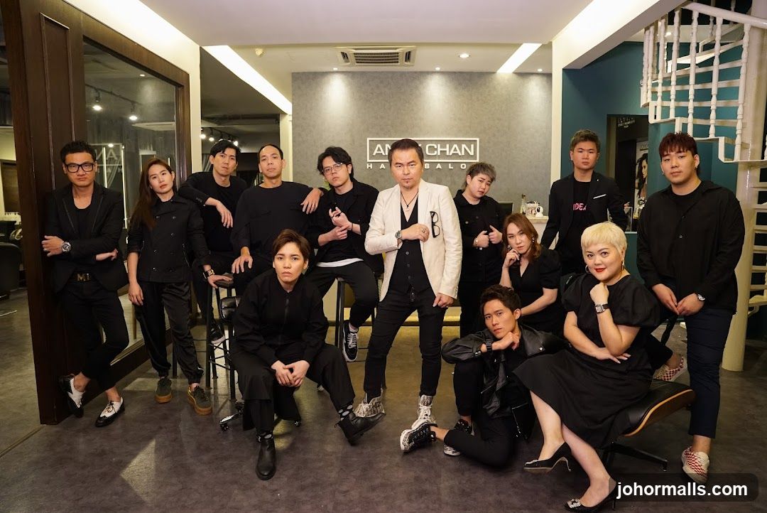 Hair salon staff posing for a group photo
