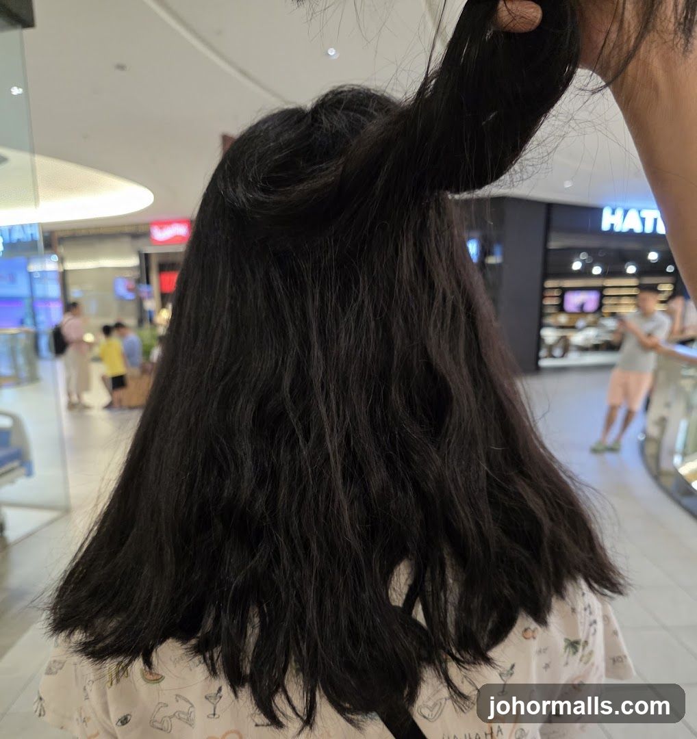 Person's Hair in a Mall