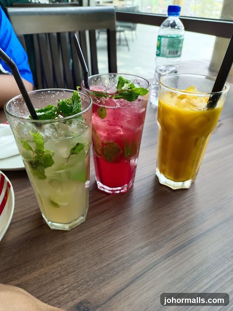 Three Refreshing Drinks on a Wooden Table