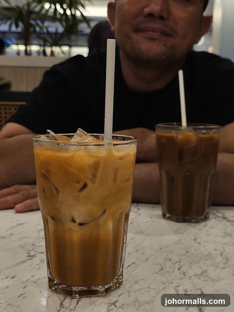 Two Iced Drinks on a Table
