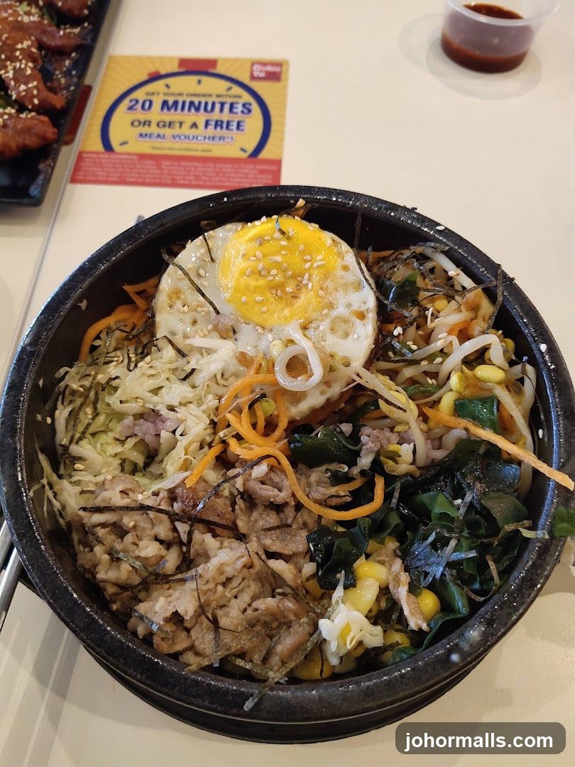 Bibimbap with a side of sauce