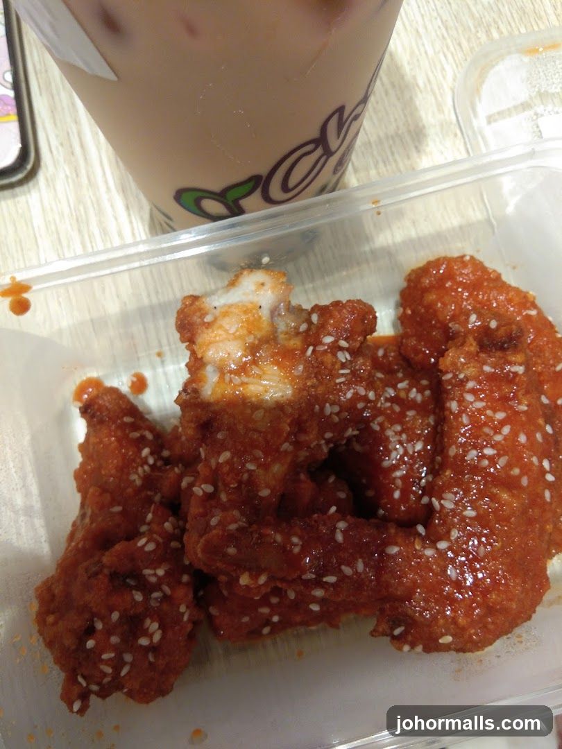 Spicy Chicken Wings and Drink