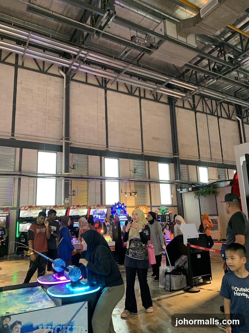 People playing arcade games