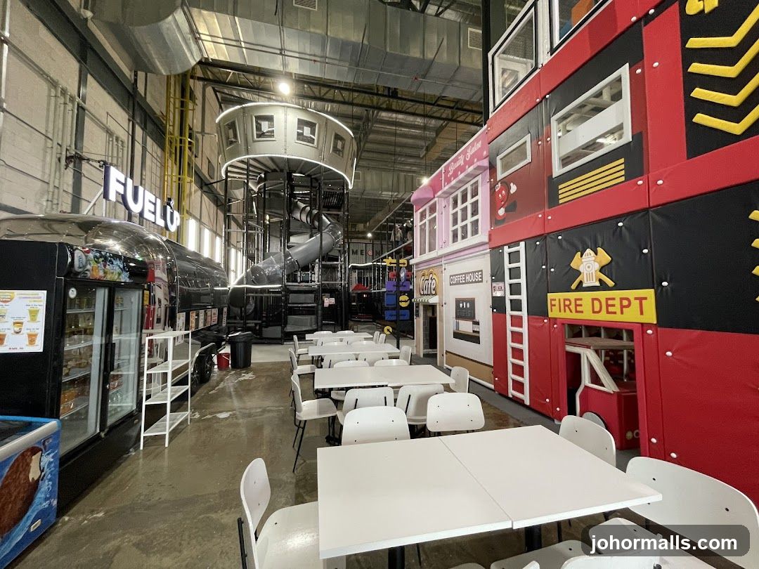 Indoor Play Area with Themed Structures and Seating