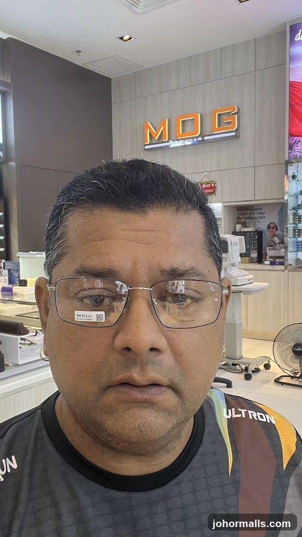 Man wearing glasses in an optical shop