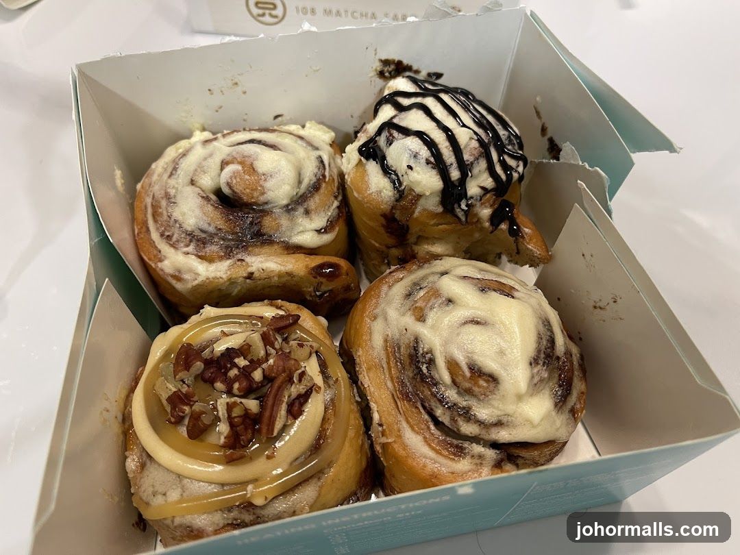 Four Cinnamon Rolls in a Box