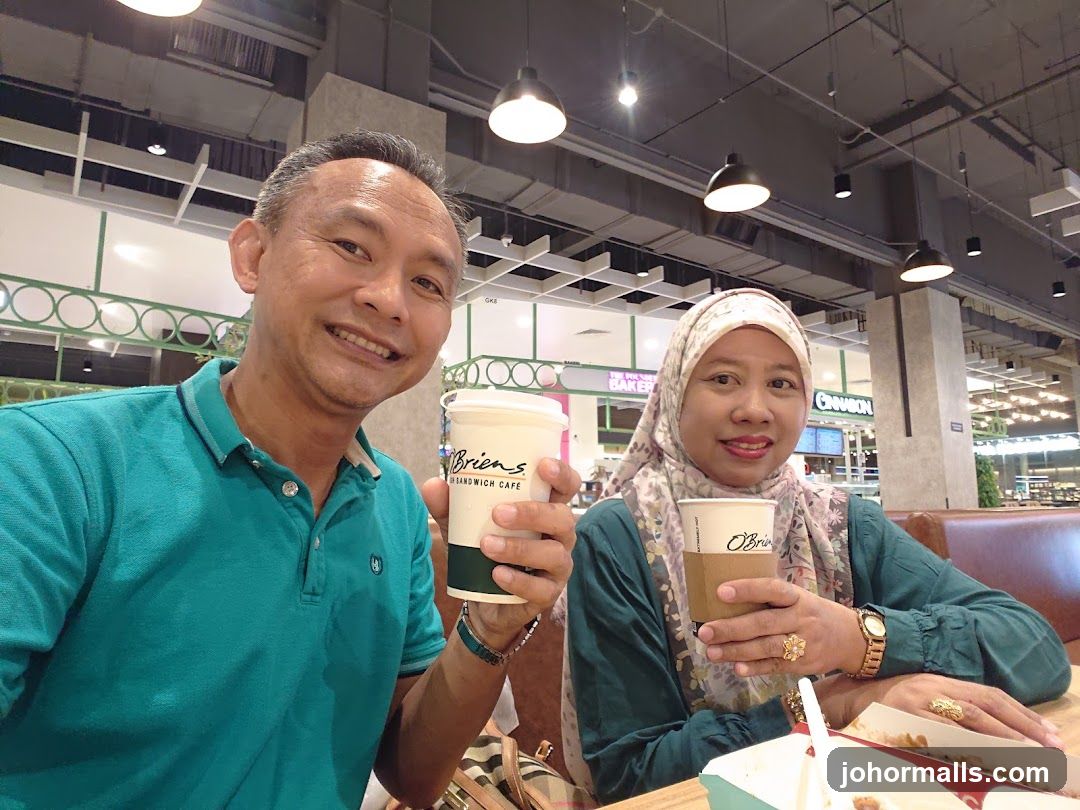 Couple enjoying drinks at a cafe
