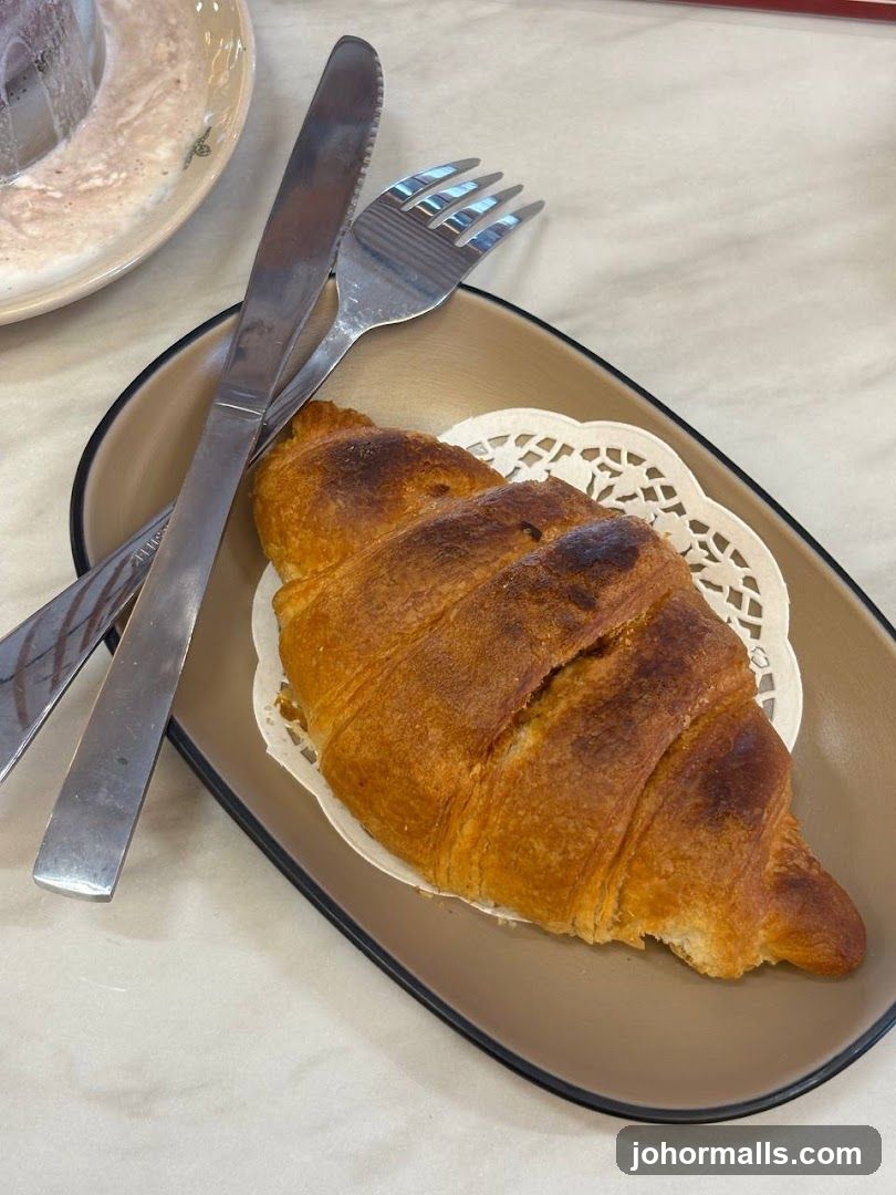 Croissant with Cutlery