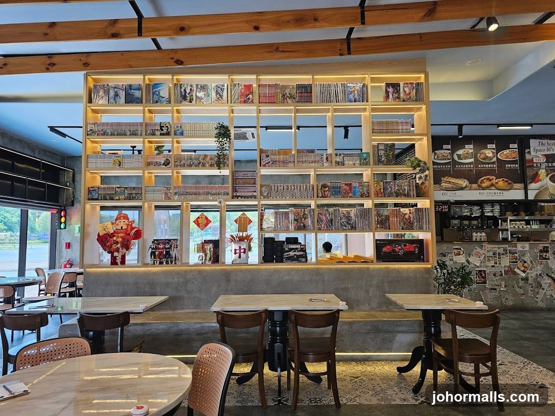 Cafe interior with bookshelves and seating