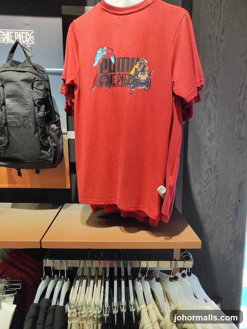 Red T-shirt with One Piece and Puma branding