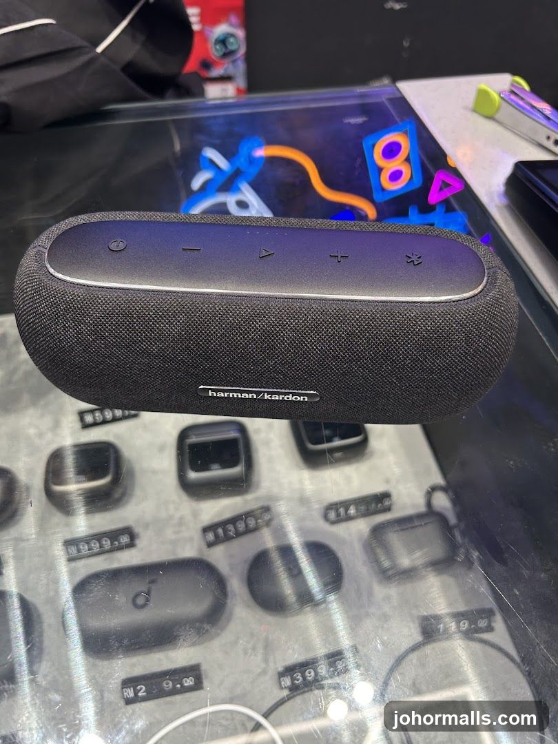 Harman Kardon Speaker and Earbuds Display